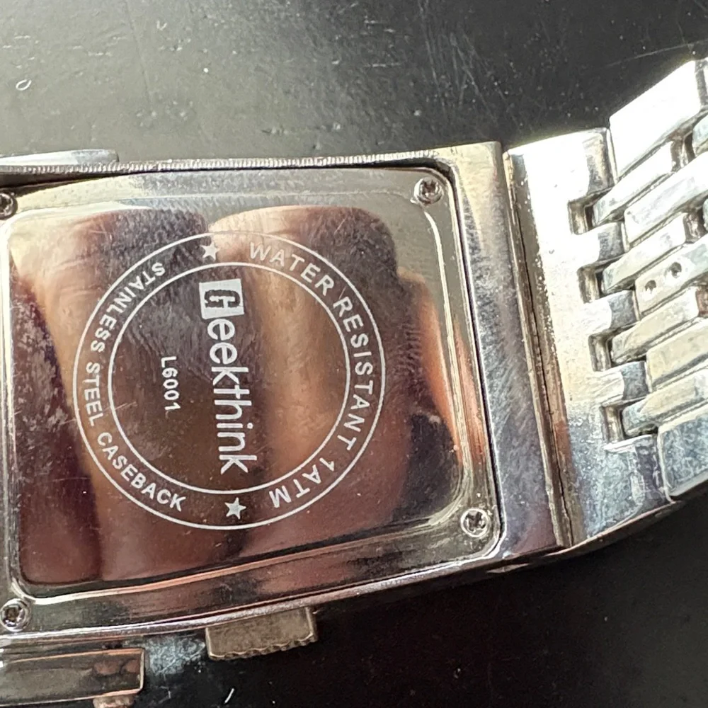 Elegant Silver Smartwatch with Blue Display